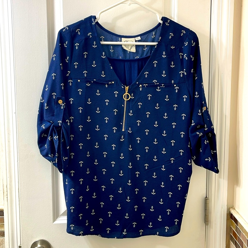 3/4 sleeve Janet Chung blouse. Navy w. white anchors and gold tone zip. Size M